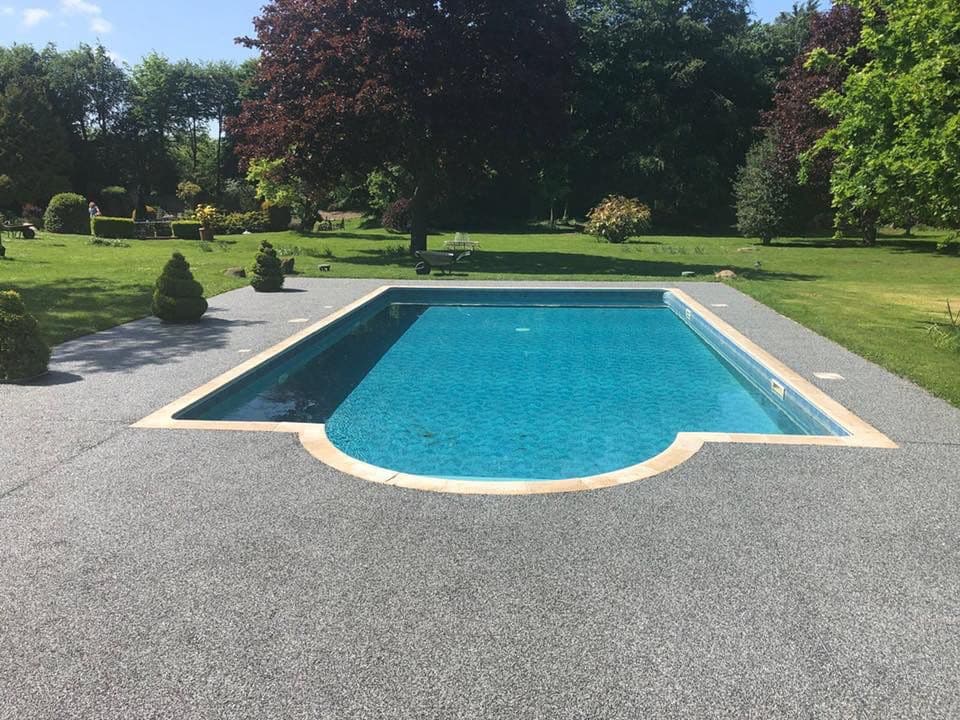 Resin surfacing around swimming pool area in Kent